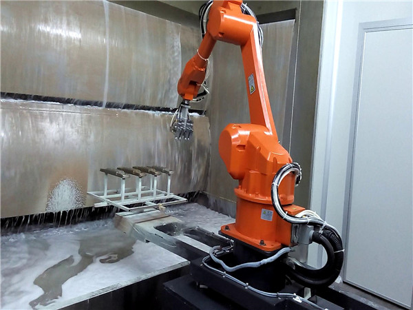 Spray-painting robot at work